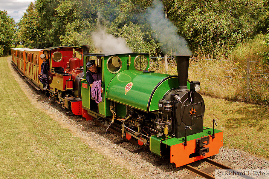 Kirklees Light Railway (Whistlestop Valley) "Badger" pilots "Monty " with a train for Country Park Halt, Evesham Vale Light Railway Gala 2023