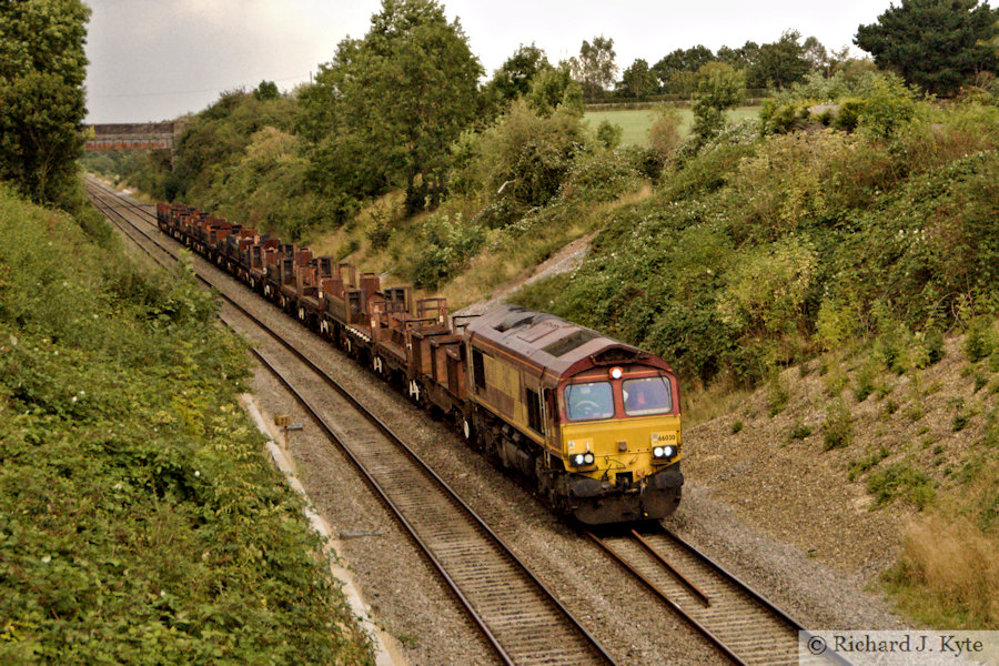 DB Cargo Class 66 Diesel no. 66030 on service 673R Corby B.S.C. to Margam T.C. at Bredon